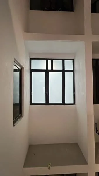 Room features: white painted walls, grey flooring, black-framed windows, natural light from window, corner window, minimalist design; style: modern.