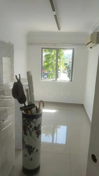 Room features: white painted walls, glossy tile flooring, window with view of greenery, 1 wall-mounted split AC, ceiling light fixture, decorative umbrella stand, rolled-up posters or plans, minimalist decor; style: modern; view: garden.