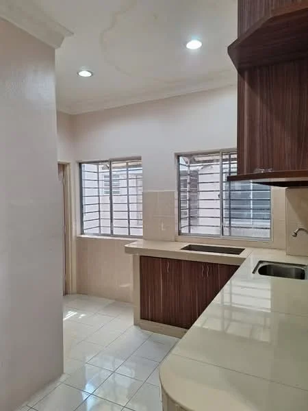 Kitchen features: white painted walls, cream tiled flooring, laminate cabinetry in dark wood finish, white countertop, single-bowl stainless-steel sink, chrome pull-down faucet, two windows with metal grills, recessed LED downlights; style: modern.
