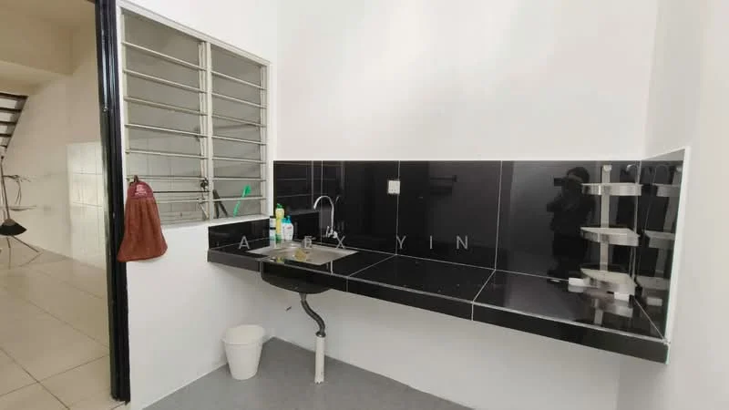 Laundry features: black granite countertop, single-bowl stainless-steel sink, chrome faucet, wall-mounted storage shelves, white plastic waste bin, grey tiled flooring, white painted walls, metal window grille; style: modern.