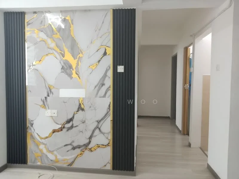 Room features: decorative wall with marble pattern in grey and gold, vertical black paneling, light grey painted walls, laminate flooring in light wood finish, doorway leading to another room; style: modern.