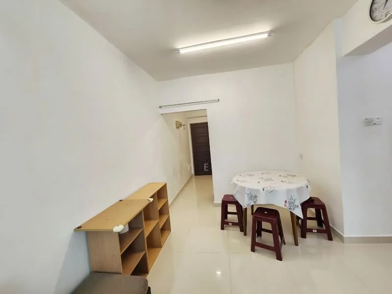 Dining features: white painted walls, glossy tile flooring, round dining table with tablecloth, 2 red plastic stools, wooden shelving unit, clock on the wall, doorway leading to another room.