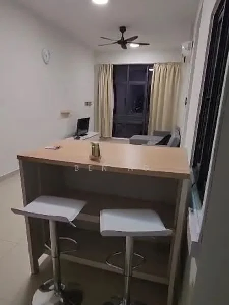 Room features: light-colored tiled flooring, white painted walls, ceiling fan, large window with sheer curtains, wooden countertop, two bar stools, wall-mounted clock, TV on a small stand, sofa in grey fabric, neutral-colored curtains; style: modern.