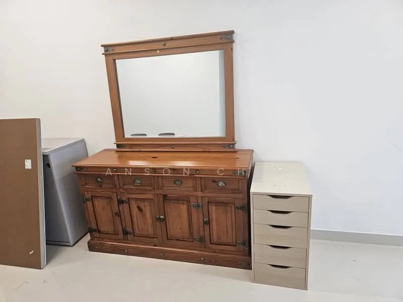 Room features: wooden dresser with multiple drawers, large framed mirror, cream-colored storage cabinet with drawers, grey tiled flooring, plain white walls; style: traditional.