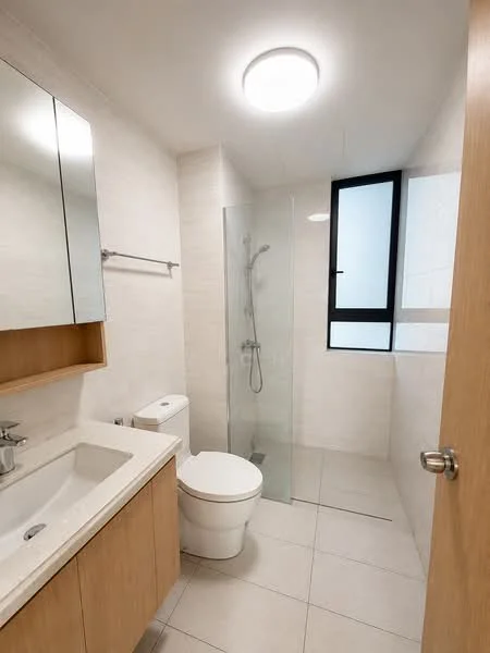 Bathroom features: single-sink vanity with wood cabinet, chrome basin mixer faucet, framed mirror, one-piece toilet, walk-in shower with glass enclosure, rain shower head, tile cladding on walls, light-colored tile flooring, recessed ceiling light; style: modern.