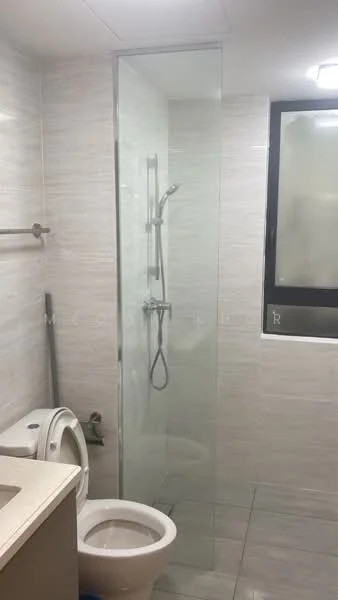 Bathroom features: glass shower enclosure, rain shower head, handheld shower, white ceramic toilet, single-sink vanity with countertop, mirror above vanity, light fixture on ceiling, grey wall tiles, white floor tiles; style: modern.