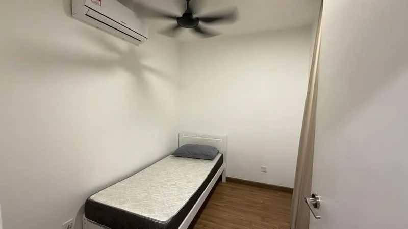 Bedroom features: single bed, grey bed linen, wooden flooring, white painted walls, 1 wall-mounted split AC, 5-blade ceiling fan, window with curtain, light switch, door with handle; style: minimalist.