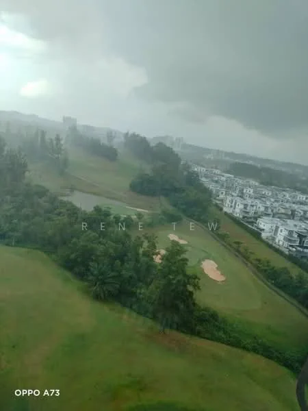 Exterior features: golf course, lush greenery, water features, hills, residential area in background, overcast sky.