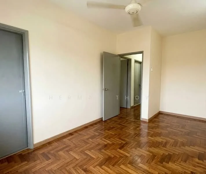Room features: wooden flooring, cream painted walls, ceiling fan, two grey doors, one door partially open, natural light from window, neutral decor.