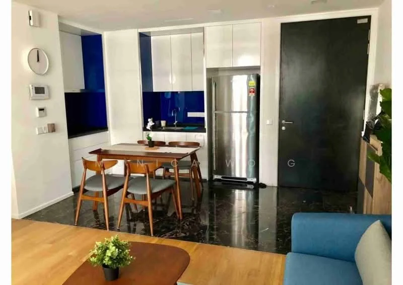 Kitchen features: blue and white cabinetry, stainless-steel fridge, built-in oven, 4-burner gas hob, white quartz countertop, black marble flooring, single-bowl stainless-steel sink, chrome pull-down faucet, pendant lighting, wall-mounted smart switches, open shelving, dining table with 4 wooden chairs; style: modern. Living features: blue fabric sofa, wooden coffee table, decorative plant, wall clock, TV console; style: modern.