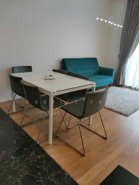 Dining features: 6-seater dining table, white rectangular dining table, 4 grey dining chairs with metal legs, area rug with neutral color, green fabric sofa, floor-to-ceiling windows with sheer curtains, curtains in grey, recessed ceiling lights; style: modern.