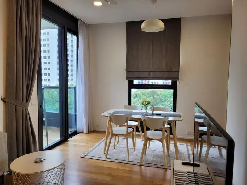 Dining features: 4-seater dining table, white table with wooden legs, 4 white dining chairs, large window with city view, sheer curtains, grey roller blinds, wooden flooring, decorative vase with flowers, area rug, wall-mounted mirror, recessed ceiling lights; style: modern; view: city.