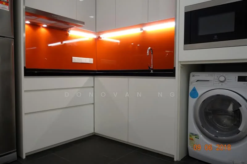 Kitchen features: white cabinetry, black countertop, orange glass backsplash, stainless-steel range hood, single-bowl stainless-steel sink, chrome pull-down faucet, built-in washing machine, tile flooring, LED under-cabinet lighting; style: modern.
