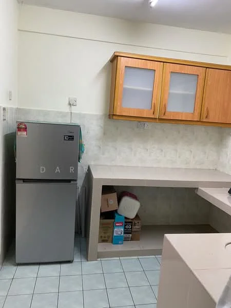 Kitchen features: stainless-steel fridge, wood cabinetry with glass-front upper cabinets, light-colored countertop, tile backsplash, light green tiled flooring, under-counter storage, wall-mounted electrical outlet, fluorescent ceiling light.