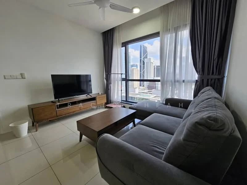 Living features: grey fabric L-shape sectional sofa, wood coffee table, wood TV console, wall-mounted TV, floor-to-ceiling windows, sheer curtains, dark grey curtains, white painted walls, ceiling fan with light, tile flooring; style: modern; view: city.