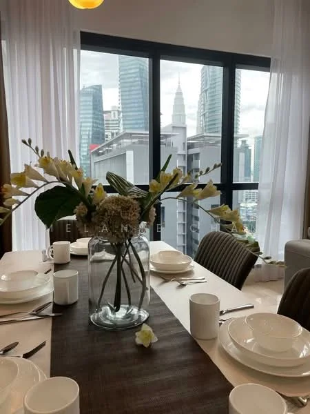 Dining features: 6-seater dining table, white ceramic plates, white mugs, glass vase with flowers, table runner, floor-to-ceiling windows, city skyline view, sheer curtains, upholstered dining chairs; style: modern; view: city.