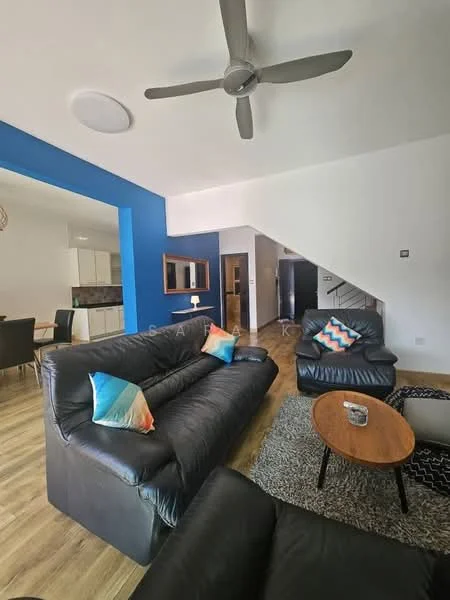 Living features: black leather sofa, 2-seater leather sofa, 3-seater leather sofa, colorful throw pillows, round wooden coffee table, area rug with geometric pattern, ceiling fan, blue accent wall, wooden flooring, wall-mounted mirror; style: modern. Room features: open layout, staircase visible, dining area visible in background.