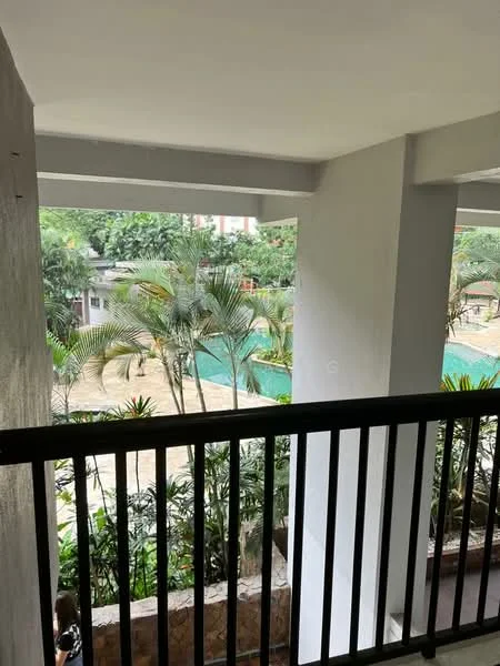 Room features: balcony with railing, concrete flooring, white painted walls, view of garden, view of swimming pool, tropical landscaping, palm trees, surrounding greenery; style: modern; view: garden.