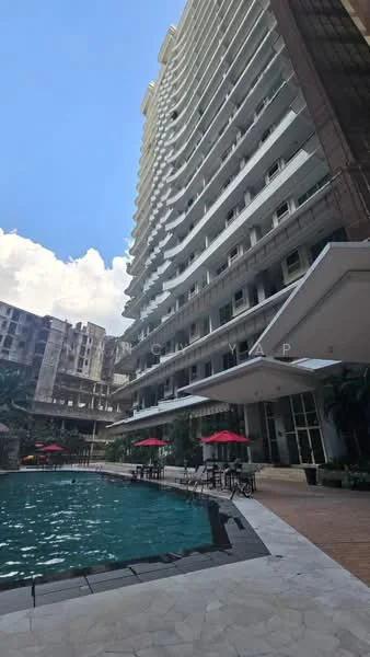 Exterior type: high-rise condominium; features: swimming pool, pool deck with loungers, outdoor dining area with umbrellas, glass curtain wall facade, balconies on upper floors, landscaped garden area, surrounded by palm trees, modern architectural design; style: modern.