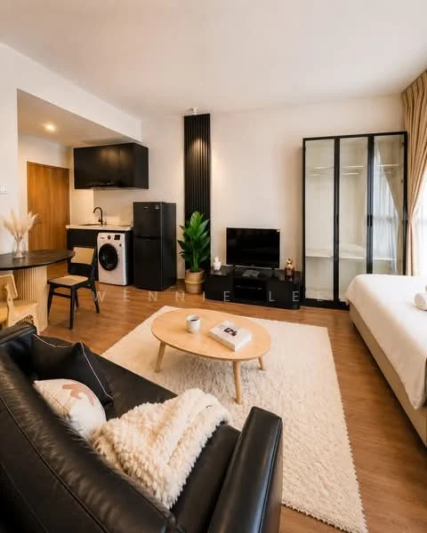 Living features: black leather sofa, round coffee table, area rug, wall-mounted TV, black glass cabinet, washing machine, kitchenette with black cabinetry, stainless-steel sink, refrigerator, potted plant, curtains, wooden flooring, light fixture; style: modern.