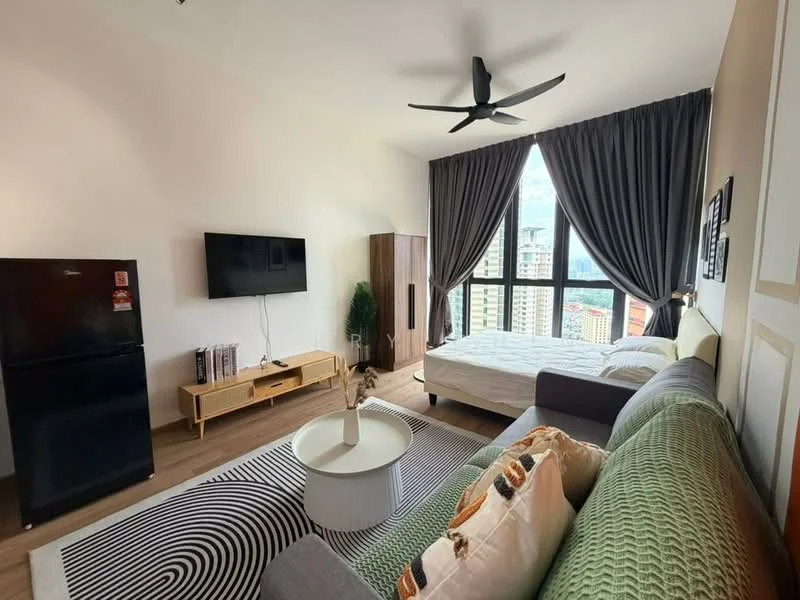 Living features: floor-to-ceiling windows, grey curtains, 3-blade ceiling fan, wall-mounted TV, wooden TV console, green fabric sofa, coffee table, area rug with geometric pattern, queen-size bed, wooden wardrobe, refrigerator; style: modern; view: city.