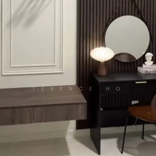 Room features: wooden desk with drawer, black cabinet with slatted design, round mirror, table lamp with a curved shade, decorative bust, white walls with decorative moulding, light-colored flooring, accent wall with vertical wood paneling; style: modern.