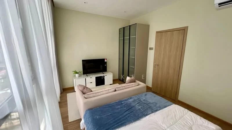 Bedroom features: queen-size bed with blue bedding, 2-seater fabric sofa in beige, white TV console, wall-mounted TV, glass-front wardrobe, wooden flooring, floor-to-ceiling windows with sheer curtains, decorative plant on console, area rug, light-colored walls, air conditioning unit; style: modern; view: city.
