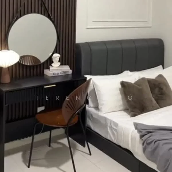 Bedroom features: black upholstered headboard, white bedding, grey throw blanket, wooden bedside table, table lamp with round shade, round mirror, wood panel accent wall, chair with metal legs, decorative bust, stack of books; style: modern.