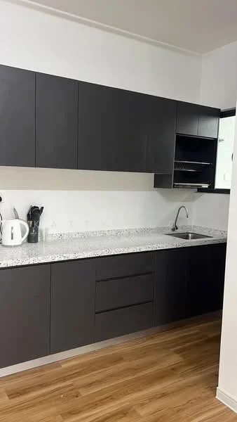 Kitchen features: black cabinetry, granite countertop with speckled pattern, single-bowl stainless-steel sink, chrome pull-down faucet, built-in upper cabinets, open shelving, wood laminate flooring, window for natural light; style: modern.