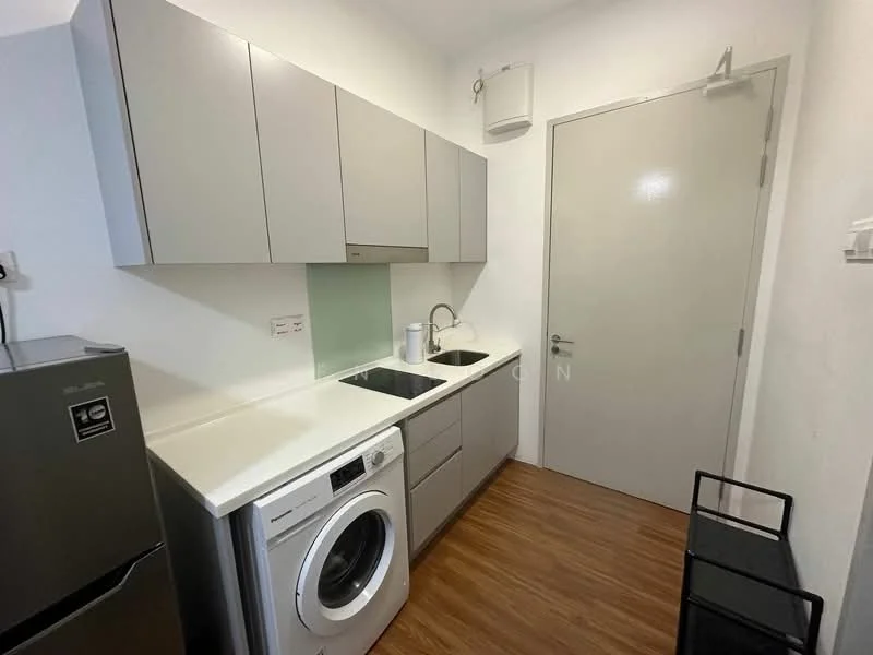 Kitchen features: grey flat-panel cabinets, white quartz countertop, single-bowl stainless-steel sink, chrome pull-down faucet, built-in oven, front-load washing machine, stainless-steel fridge, wood laminate flooring, white painted walls, recessed downlights; style: modern.