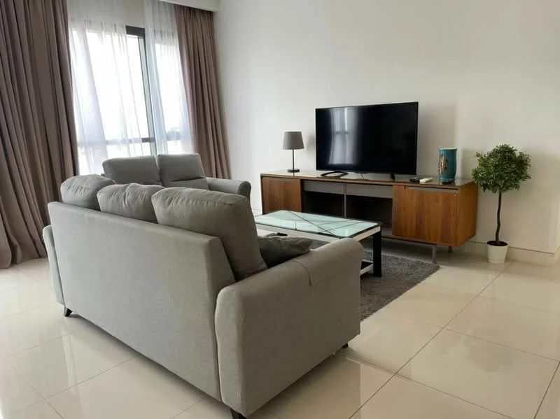 Living features: 3-seater fabric sofa in grey, glass coffee table, wooden TV console, wall-mounted TV, area rug, floor-to-ceiling windows, sheer curtains, decorative plant in pot, lamp on side table, light-colored walls, glossy tile flooring; style: modern.