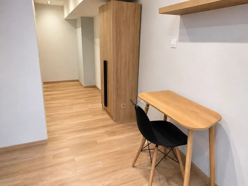 Room features: light wood flooring, white painted walls, wooden shelving, wooden desk, black chair, built-in wardrobe, recessed lighting, open space layout; style: modern.