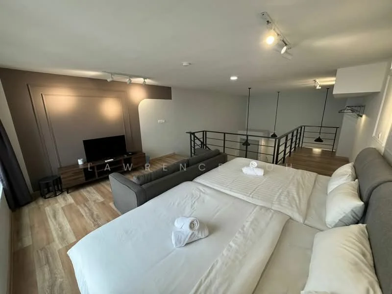 Bedroom features: king-size bed, upholstered headboard, white bedding, 2 white towels, wooden flooring, grey accent wall, sofa in grey fabric, wall-mounted TV, recessed lighting, floor-to-ceiling windows with curtains, open railing, pendant lighting; style: modern.