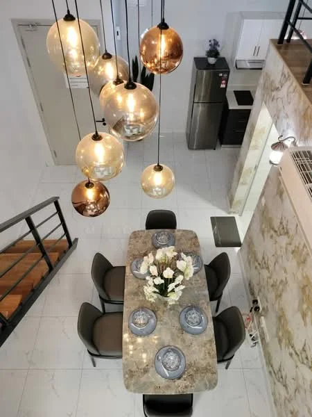 Dining features: marble dining table, 6 upholstered dining chairs, decorative vase with flowers, hanging pendant lights, white walls, tile flooring, open layout to kitchen, stainless-steel fridge visible; style: modern. Kitchen features: white cabinetry, stainless-steel appliances, countertop with backsplash, open layout to dining area; style: modern.