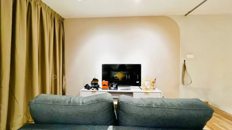 Living features: grey fabric sofa, white TV console, flat-screen TV, decorative items on console, curtains in beige, wooden flooring, wall-mounted light switch, neutral painted walls; style: modern.