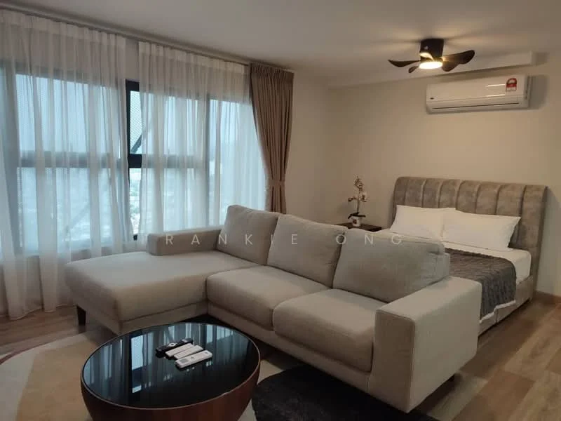 Living features: L-shape sectional sofa in light grey fabric, round coffee table with black surface, floor-to-ceiling windows with sheer curtains, wall-mounted air conditioning unit, ceiling fan with light, wooden flooring, decorative plant on side table, bed with upholstered headboard in background, bed linens in white and grey; style: modern; view: city.
