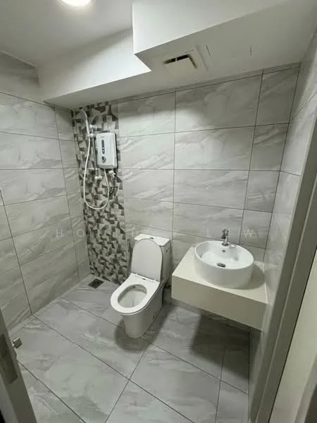 Bathroom features: white ceramic toilet, wall-mounted shower with adjustable head, single-bowl sink with wall-mounted faucet, grey marble tile flooring, grey wall tiles with decorative mosaic accent, ceiling-mounted light fixture, exhaust fan, built-in shelf; style: modern.