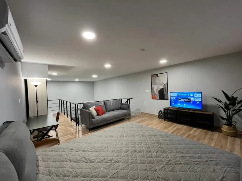 Living features: grey fabric sofa, wooden coffee table, wall-mounted TV, laminate flooring, recessed downlights, floor lamp, decorative wall art, indoor plant in pot, air conditioning unit; style: modern. Room features: open layout, staircase railing, grey painted walls.