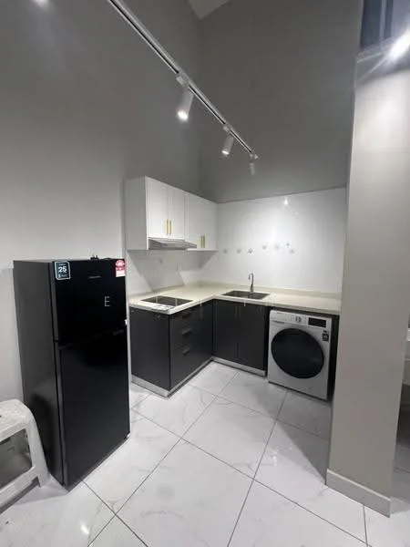 Kitchen features: black refrigerator, white cabinets with gold handles, black lower cabinets, white countertop, single-bowl stainless-steel sink, chrome pull-down faucet, built-in washing machine, ceramic tile flooring, recessed LED downlights, grey painted walls; style: modern.
