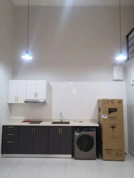 Kitchen features: white upper cabinets, dark grey lower cabinets, stainless-steel sink, chrome pull-down faucet, white countertop, built-in stove, washing machine, recessed downlights, marble tile flooring, white tiled backsplash; style: modern.