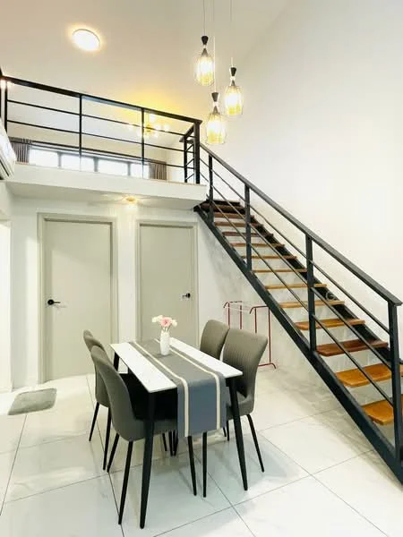 Dining features: white painted walls, tile flooring, 5-blade ceiling fan with light, pendant lighting with glass shades, 4-seater dining table, upholstered dining chairs in grey, staircase with wooden steps and metal railing, two doors leading to unknown rooms; style: modern.