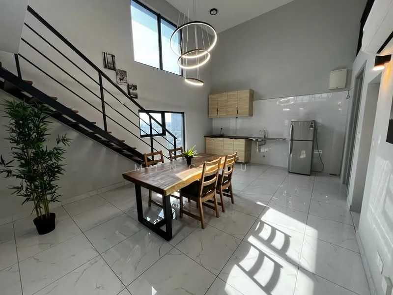 Dining features: marble tile flooring, grey painted walls, high ceiling, large windows, wooden dining table, 4 wooden dining chairs, pendant light fixture, stainless-steel fridge, kitchen cabinetry, sink, countertop, indoor plant; style: modern. Room features: metal staircase, open space, natural light.