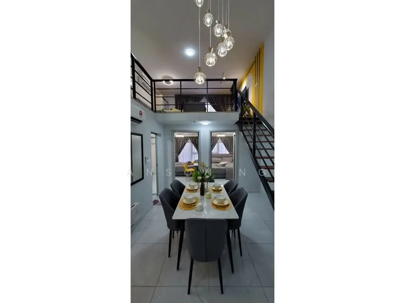 Dining features: rectangular dining table with white surface, 4 upholstered dining chairs in grey, pendant lighting with multiple glass bulbs, grey tiled flooring, decorative vase with flowers on the table, wall-mounted mirror, open staircase with black railing, curtains in neutral tones; style: modern. Living features: sofa area visible in the background, wall-mounted TV, decorative wall art, carpet on the floor; style: modern.