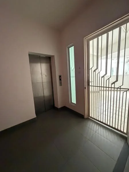 Room features: elevator door, glass window, metal security grille door, grey tiled flooring, white painted walls, light switch, intercom panel; style: modern.