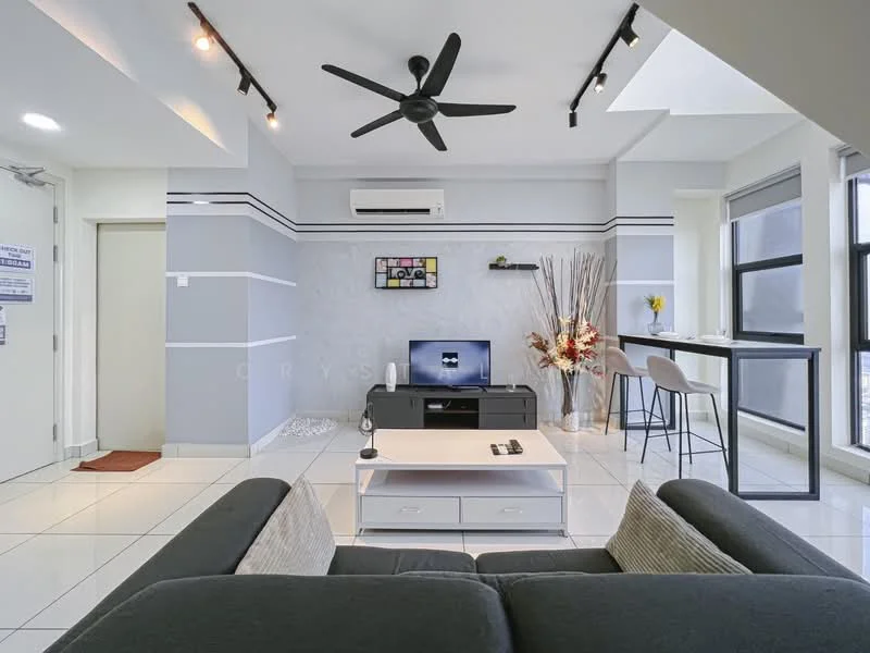 Living features: 5-blade ceiling fan with light, wall-mounted split AC, grey accent wall, white painted walls, polished tile flooring, sofa in dark grey, coffee table, TV console, wall-mounted TV, decorative plants, artwork on wall, bar table with stools, large windows with city view; style: modern; view: city.