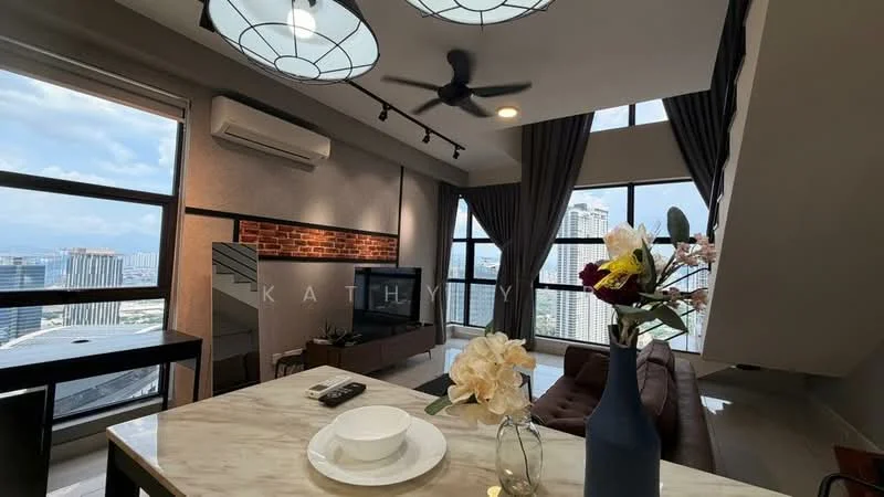 Living features: grey painted walls, exposed brick accent wall, marble countertop, 3-seater leather sofa in brown, wall-mounted TV, coffee table, 5-blade ceiling fan with light, floor-to-ceiling windows, sheer curtains, decorative vase with flowers, decorative bowl, recessed downlights; style: modern; view: city.