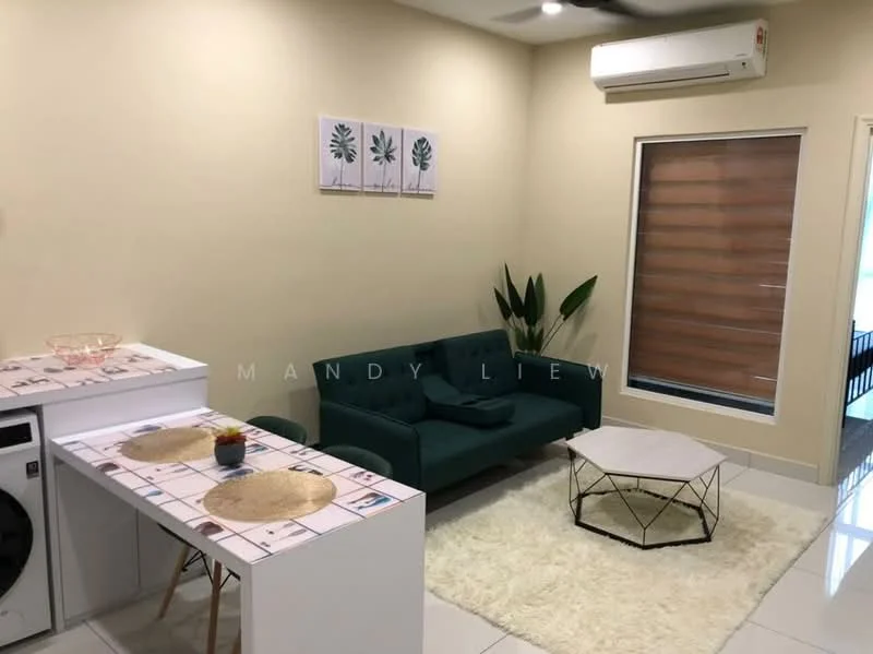 Living features: green fabric sofa, white coffee table with black metal legs, area rug with fluffy texture, wall-mounted split AC, large window with wooden blinds, decorative houseplants, framed wall art with leaf patterns, white side table, washing machine, light-colored painted walls, glossy tile flooring; style: modern.