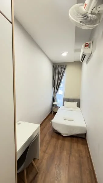 Bedroom features: single bed, grey upholstered headboard, white bedding, wooden flooring, wall-mounted split AC, desk with chair, curtains, recessed ceiling lights, white painted walls; style: modern.