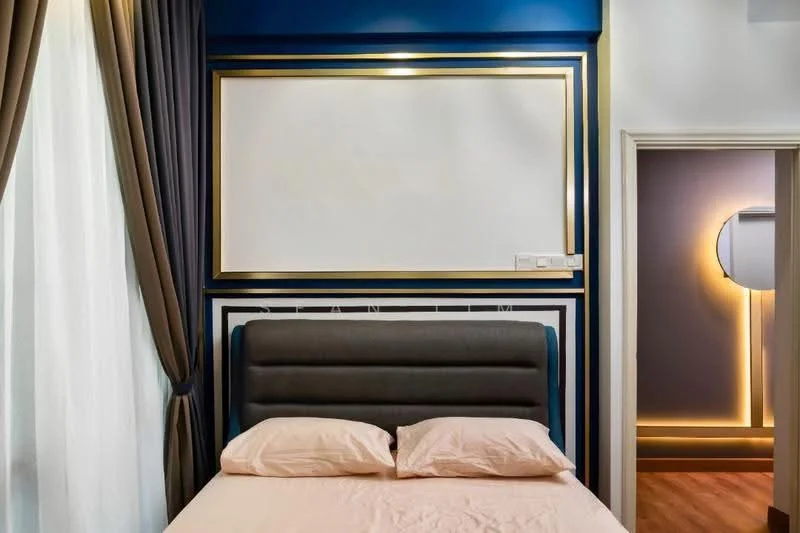 Bedroom features: upholstered headboard, queen-size bed, light-colored bedding, blue accent wall, gold trim around wall, floor-to-ceiling curtains, sheer white curtains, wooden flooring, decorative wall paneling, wall-mounted light fixture; style: modern.