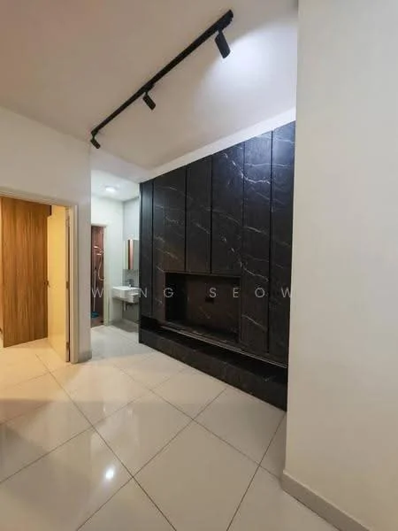 Room features: white painted walls, black stone feature wall, glossy white tile flooring, recessed lighting, track lighting, built-in cabinetry, open doorway leading to another room, mirror on wall; style: modern.
